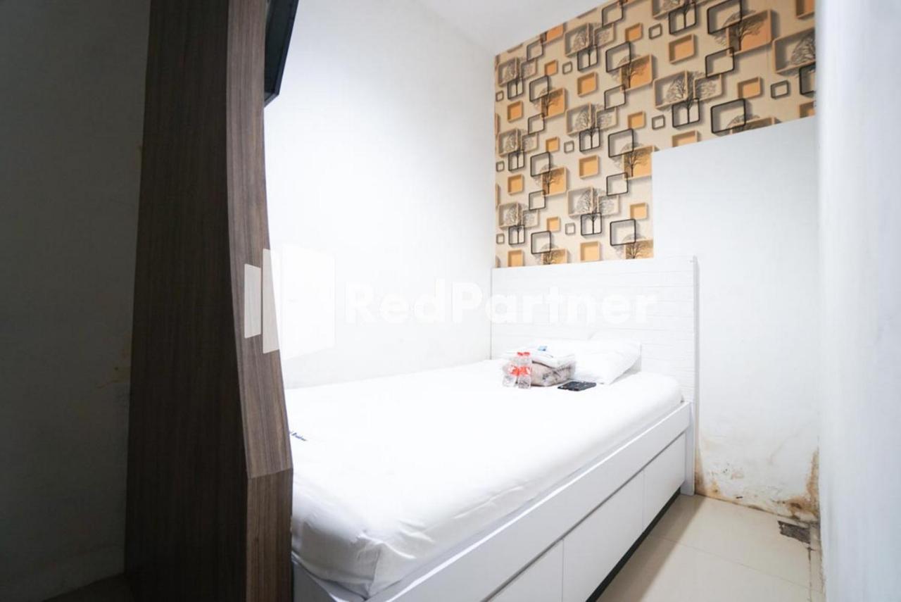 Eascot Hotel Mitra Reddoorz จาการ์ตา ภายนอก รูปภาพ